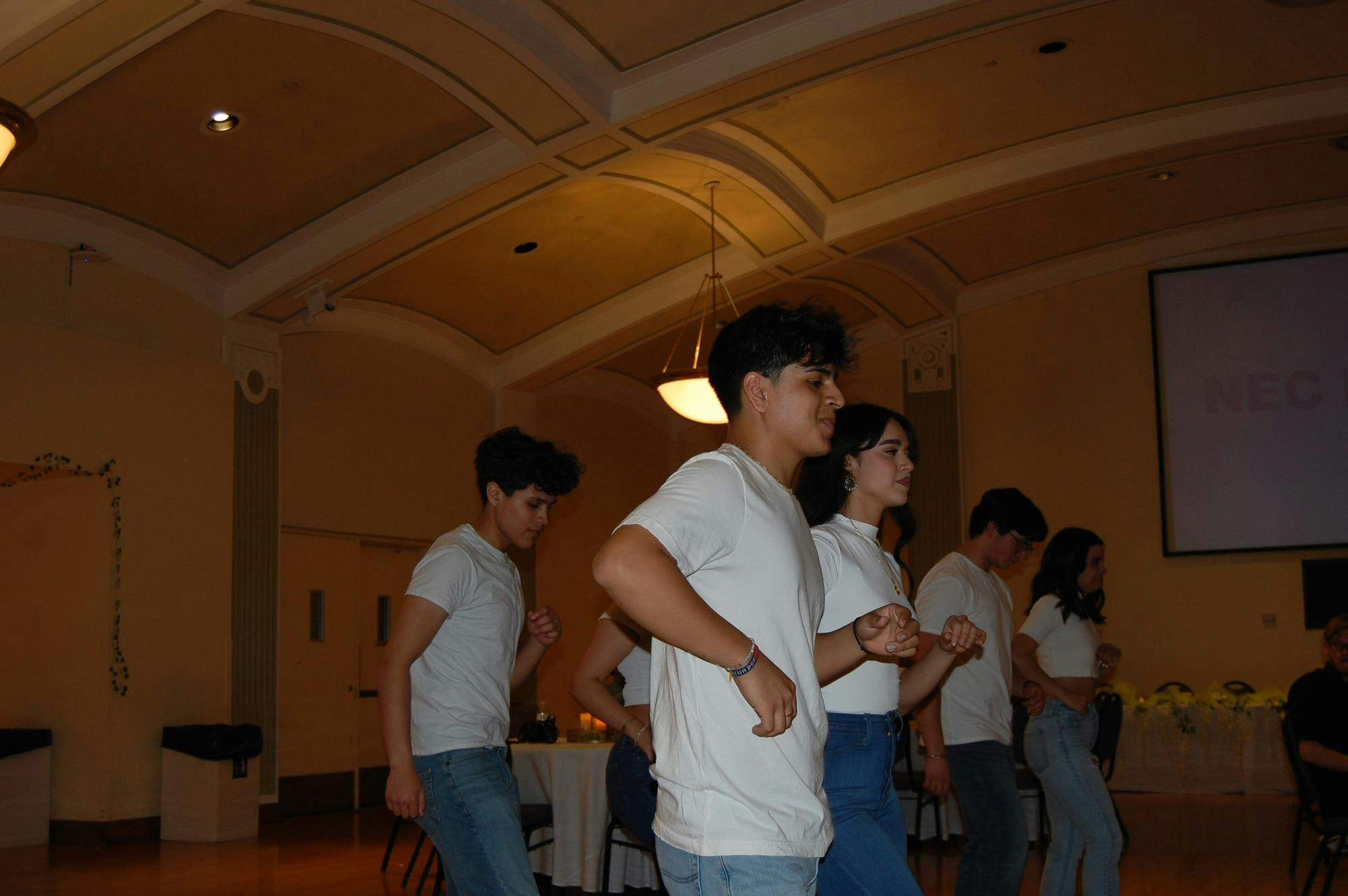 Dancers move to the beat at the sixth annual Quinceanera hosted by the Latinx Student Association at Eastern Michigan University. 