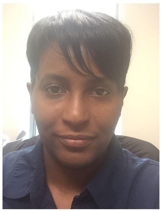 Political Science Professor Barbara Patrick, seen in a promotion for the EMU Honors College Star Lecture Series, heads the political science department at Easten Michigan University.