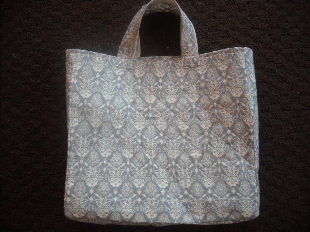 	This tote was created for less than $12, and took one weekend to finish.