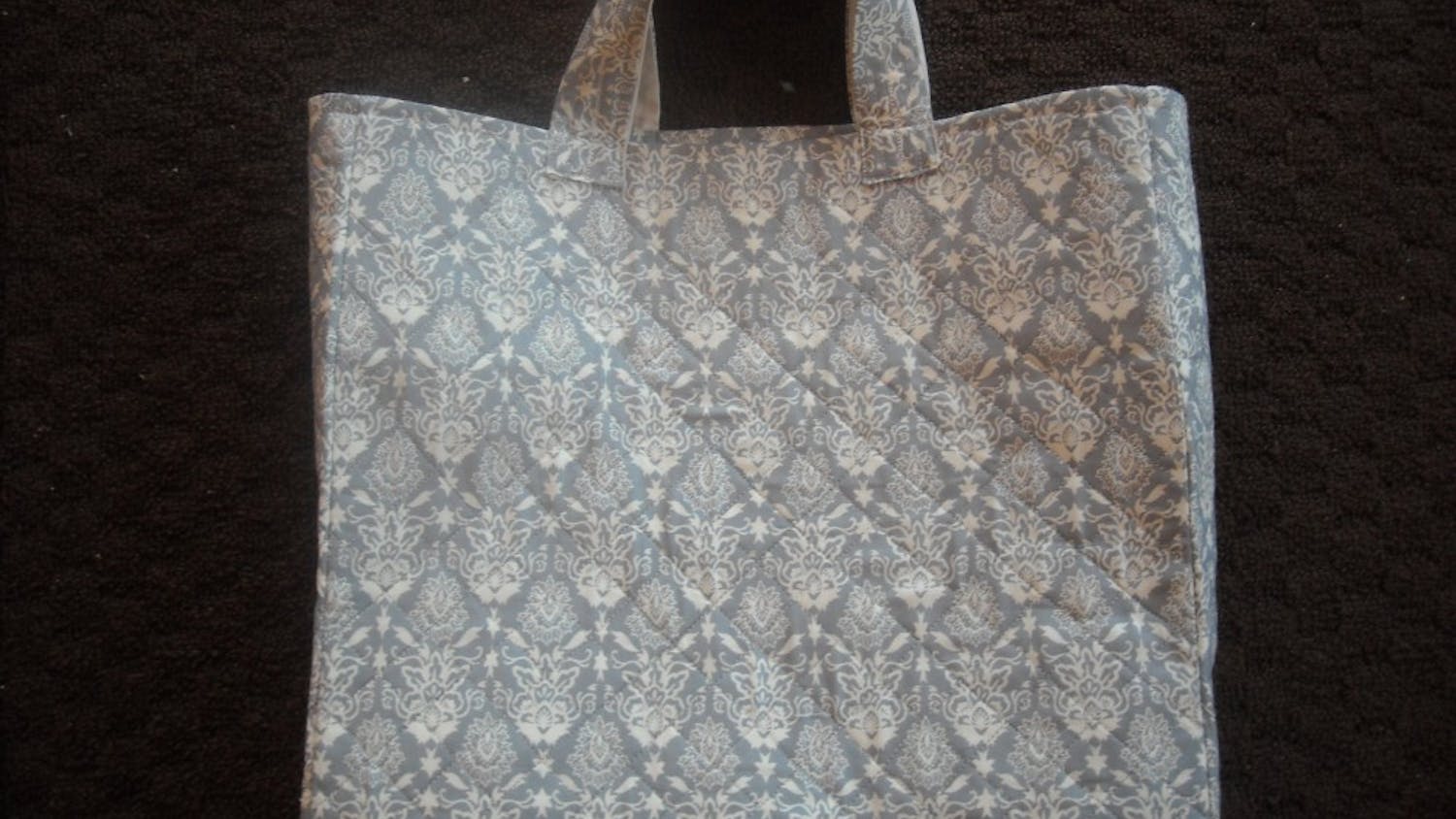 	This tote was created for less than $12, and took one weekend to finish.