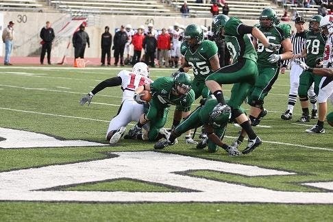 Corey Welch rushes for a 12-yard touchdown in the second quarter at Rynearson Stadium.