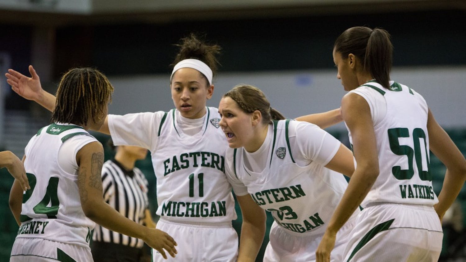 EMU forward Olivia Fouty (33) rallies the team in the first half of Eastern Michigan's 83-77 win over Western Michigan Wednesday night.