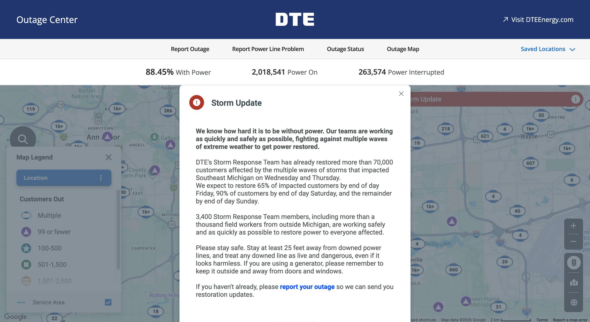 A warning banner appears on the DTE outage map website with updates on the company's efforts to restore power and warnings about downed power lines.