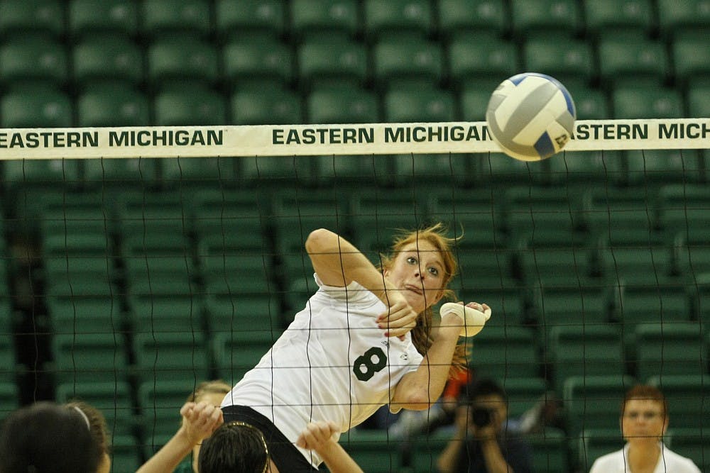 Senior Victoria Randolph spikes the ball Saturday against Western Michigan. She and fellow senior Kim Jarzynka played their final home match at the Convocation Center, but will continue their collegiate careers in the MAC tournament Tuesday.