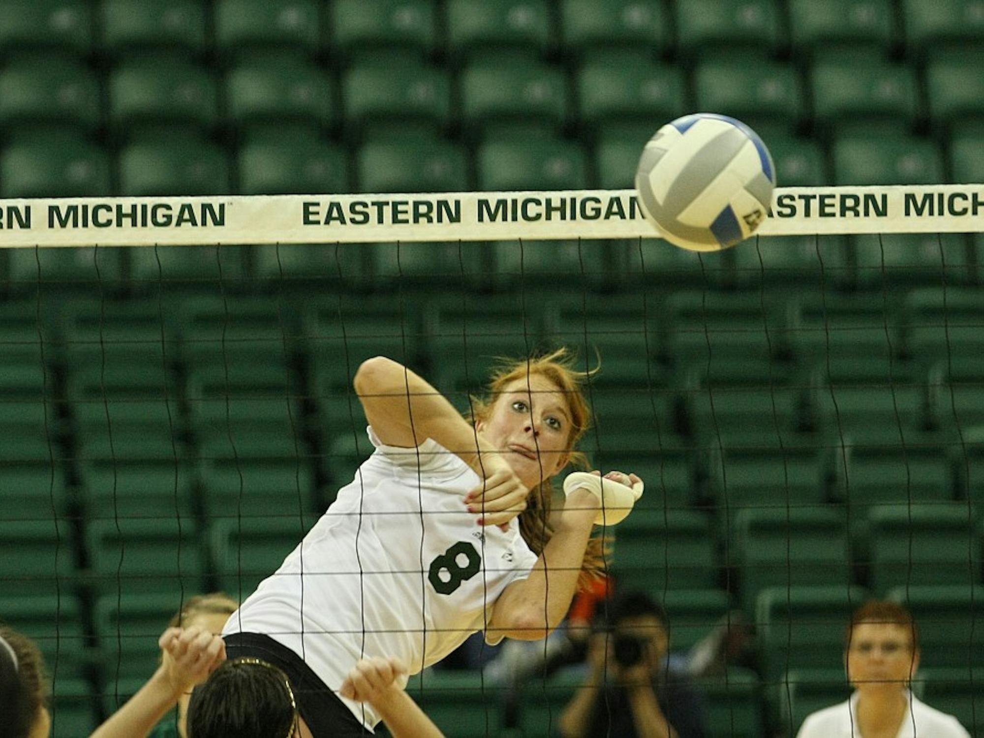 Senior Victoria Randolph spikes the ball Saturday against Western Michigan. She and fellow senior Kim Jarzynka played their final home match at the Convocation Center, but will continue their collegiate careers in the MAC tournament Tuesday.
