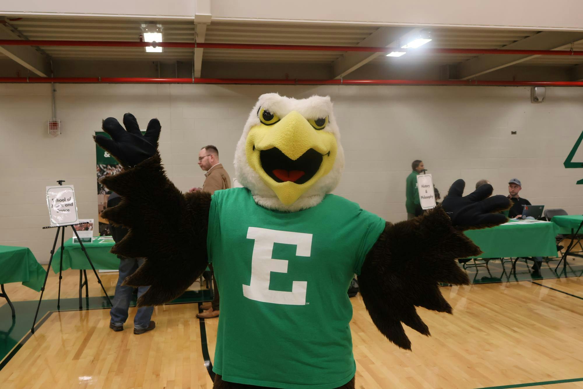 Swoop mascot standing with his arms out in the Rec/IM during the Registration Blitz.