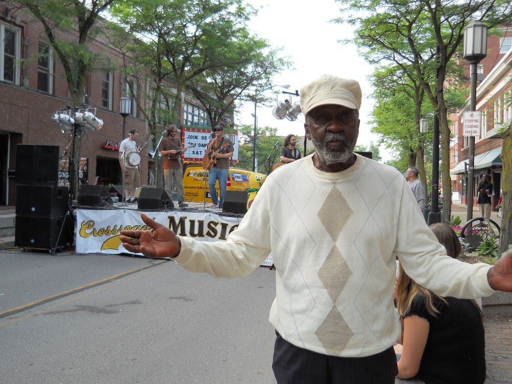 Tyrone Thomas, self-proclaimed ‘The Brown Warlock,’ said he hasn’t had this much fun since he slapped his mother-in-law. He has lived in Ypsilanti since 1972 after serving in the military as a combat medic.