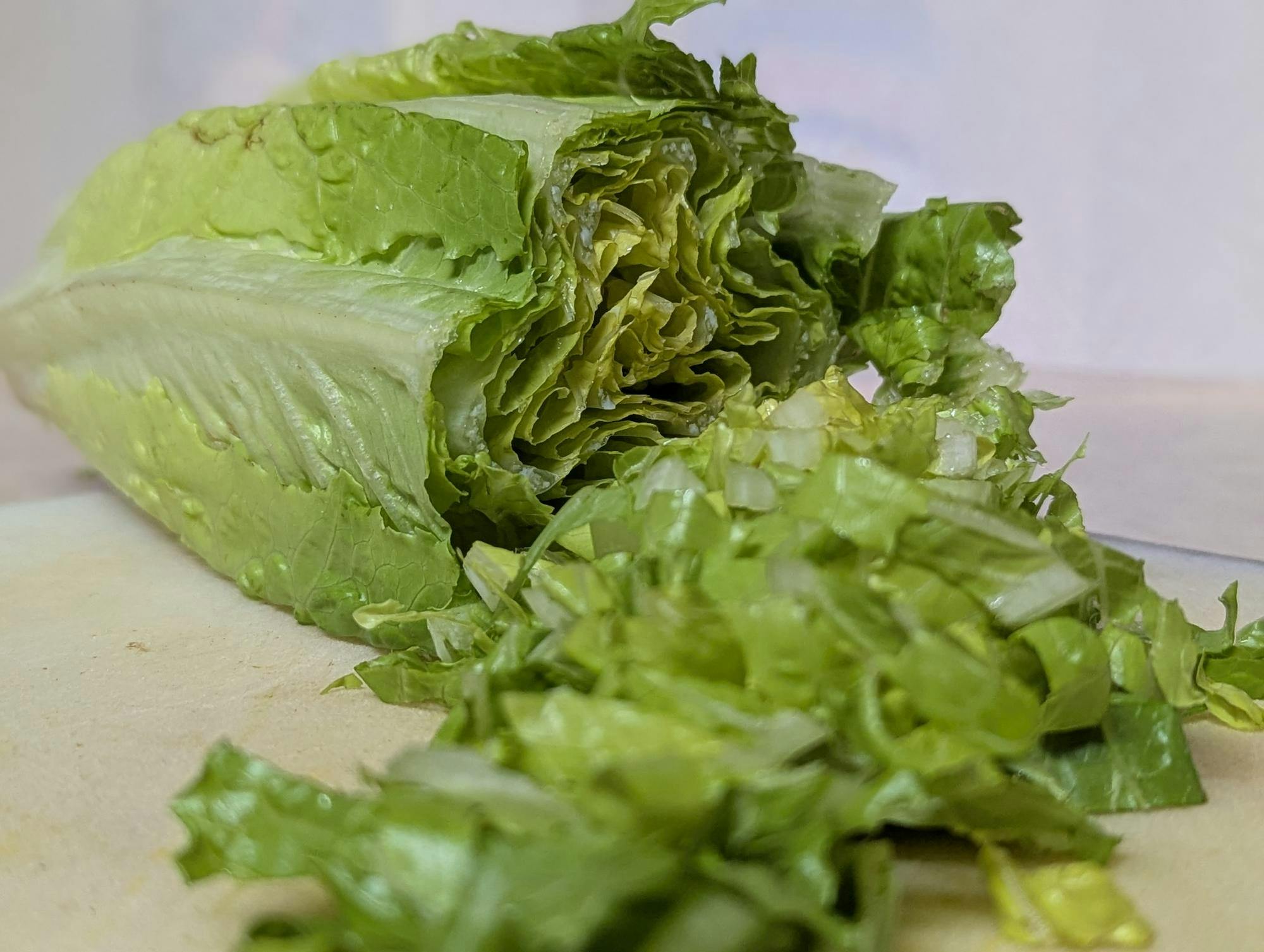 A chopped up heart of romaine lettuce.