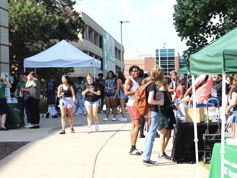 Students attend EMU's Commuter Cookout event on Sept. 5, 2023. Photo Credit: Aaron Hughes