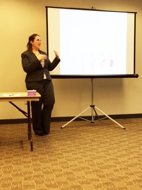 Jenni Hoffman, PhD, explains the in's and out's of cervical cancer to students. 