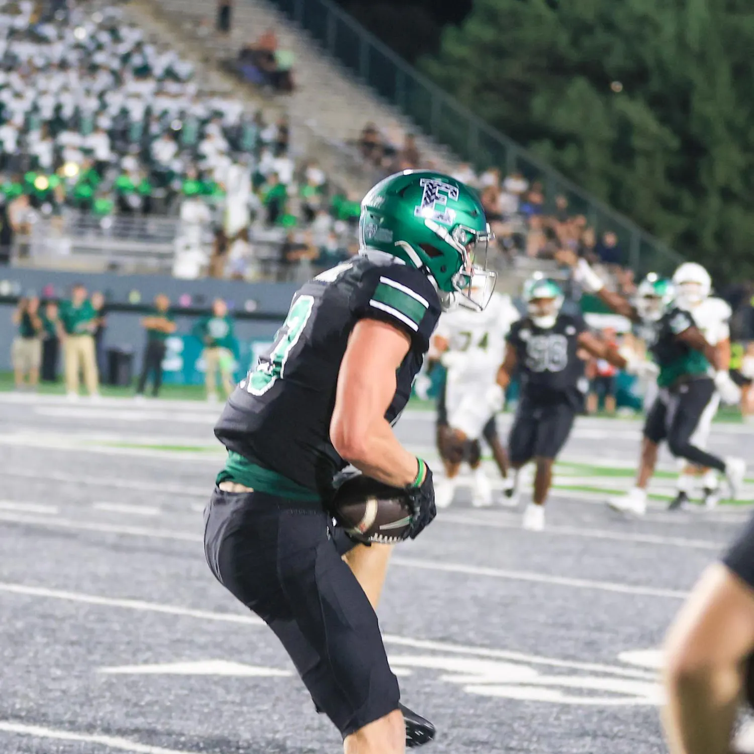 No. 13 Jason Marshall intercepting the ball