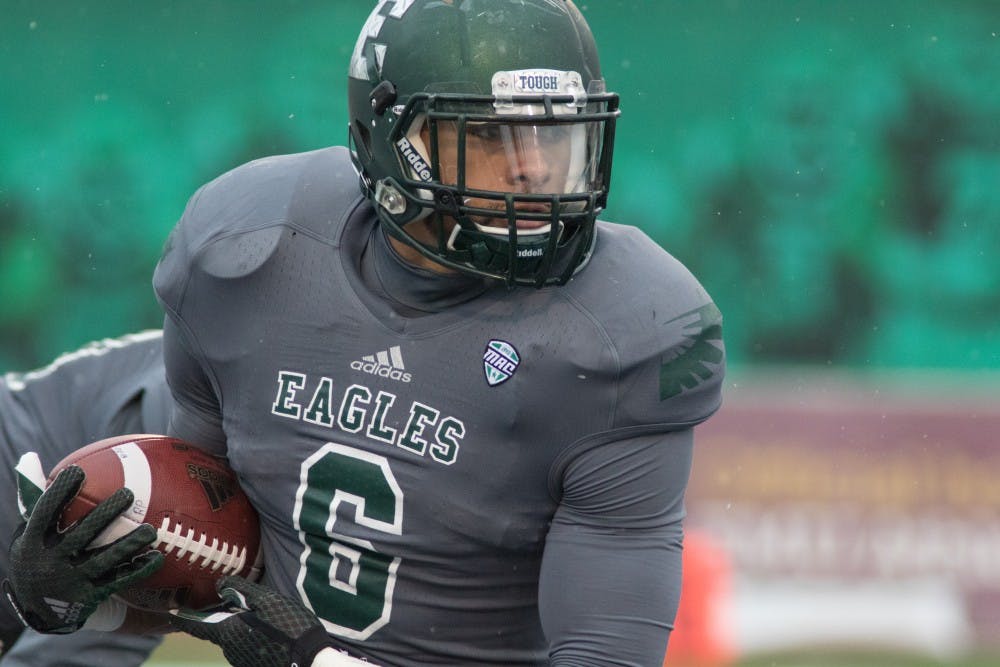 Eastern Michigan running back Darius Jackson rushes the ball in the Eagles 52-16 loss to Toledo Friday afternoon in Ypsilanti.