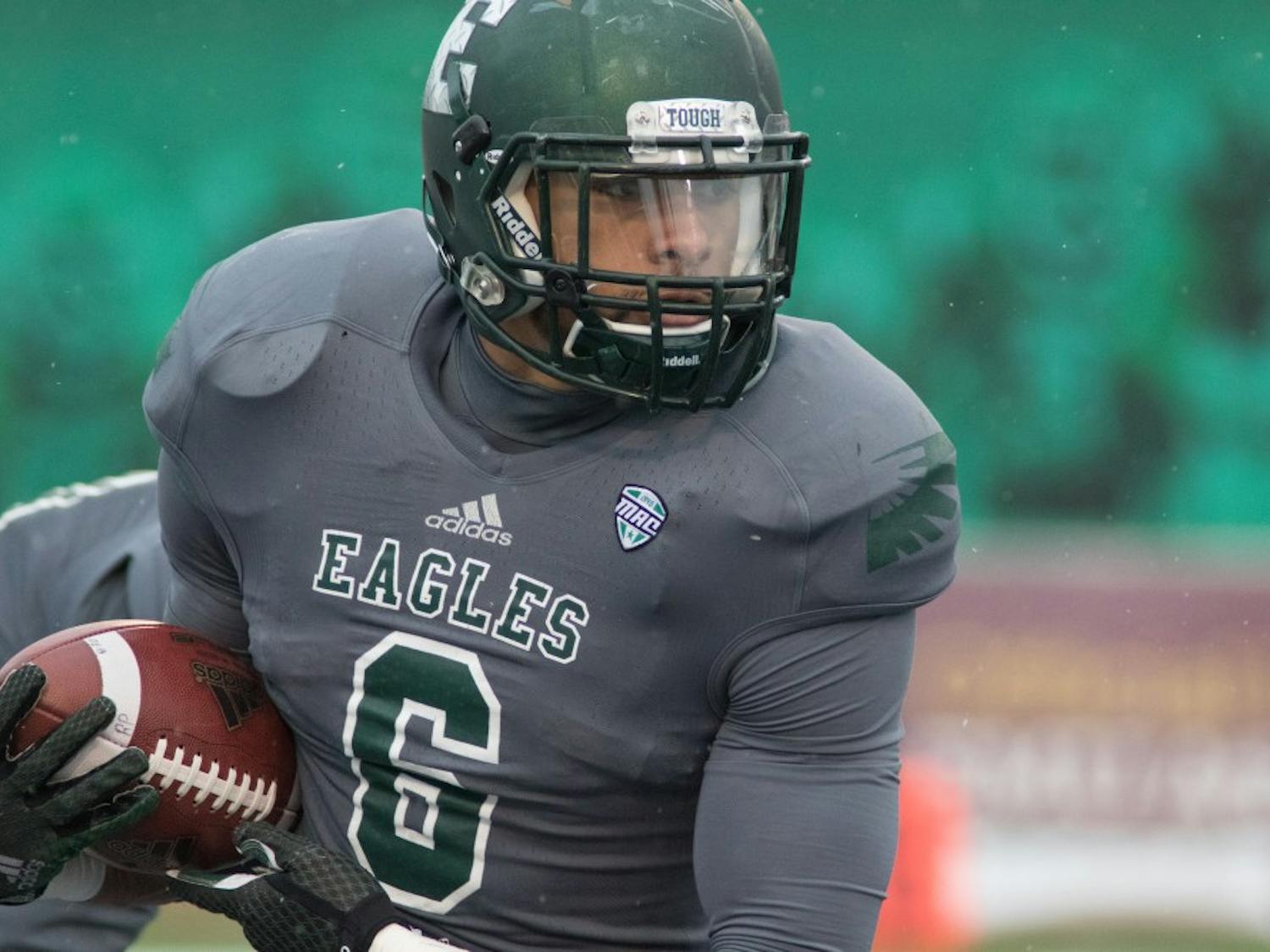 Eastern Michigan running back Darius Jackson rushes the ball in the Eagles 52-16 loss to Toledo Friday afternoon in Ypsilanti.