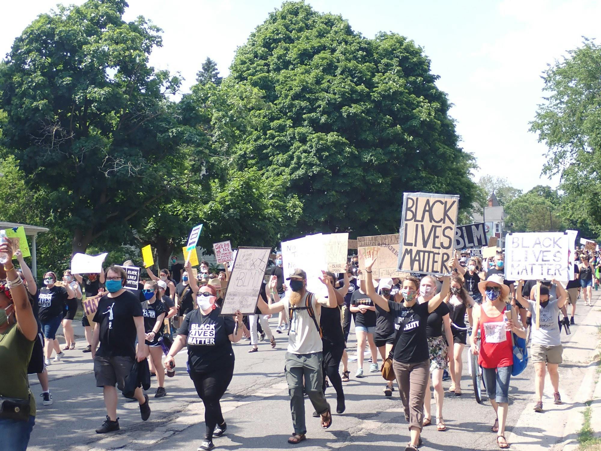 Black Lives Matter protestors march on Hamilton St. in Ypsilanti, Saturday, June 20, 2020. 