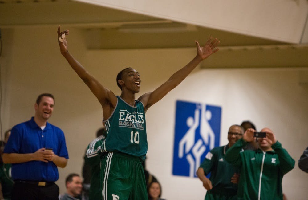 Tim Bond celebrates winning the Rock the Rec Slam Dunk Championship during Rock the Rec 2 at the Rec/IM building on Tuesday, October 28, 2014.