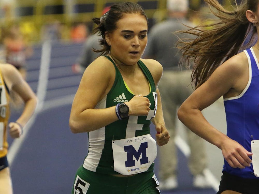 Eastern Michigan University Track and Field runner Esme Davies participates in a race for the Eagles. 