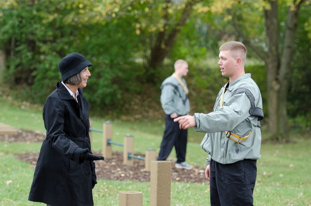 	EMU Executive Director of Student Well Being Ellen Gold talks to ROTC Senior Shawn Saputo at the new recreation area.