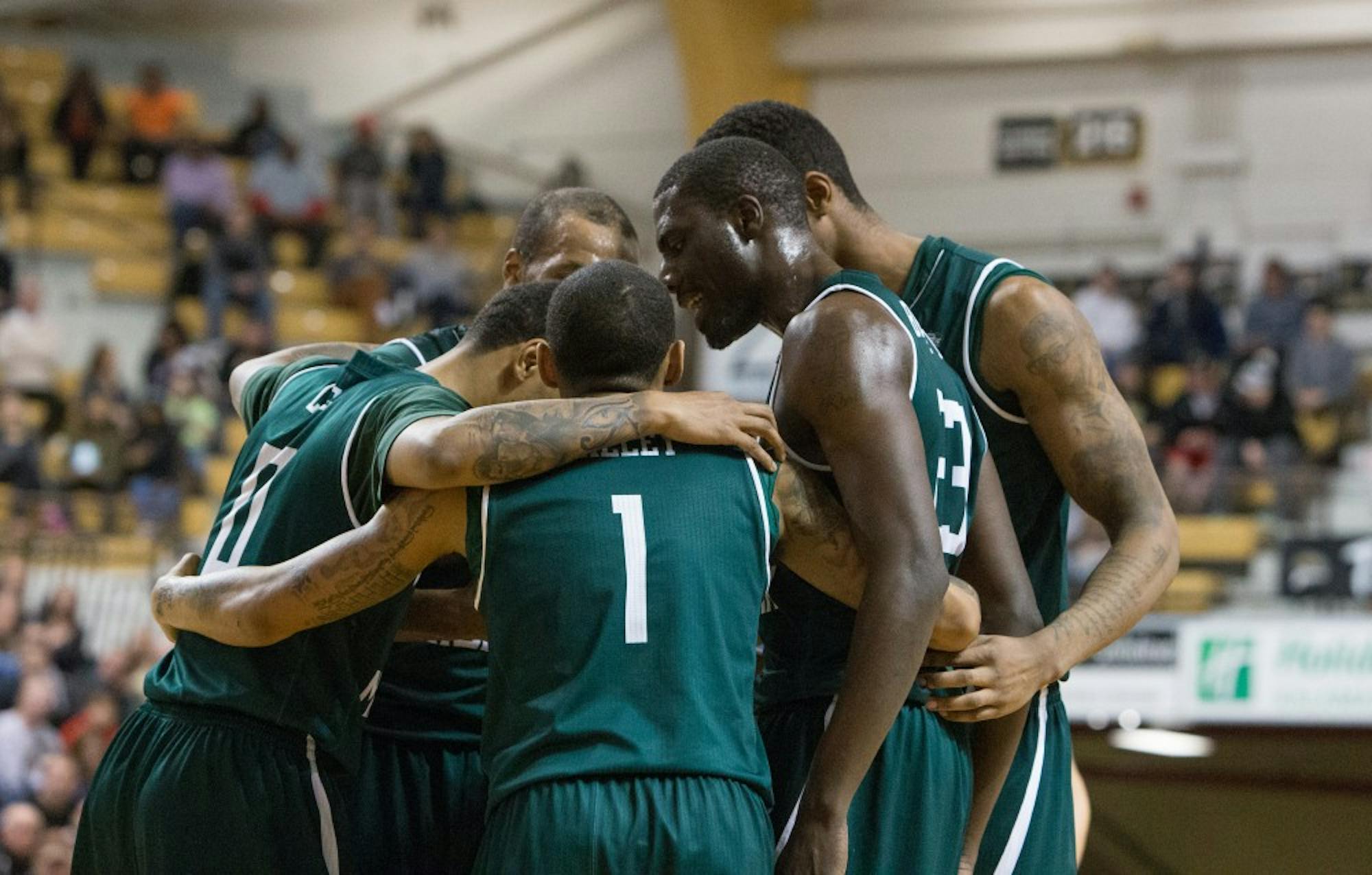 Eastern Michigan regroups before free throws in the Eagles 75-67 loss to Western Michigan Sunday afternoon in Kalamazoo.