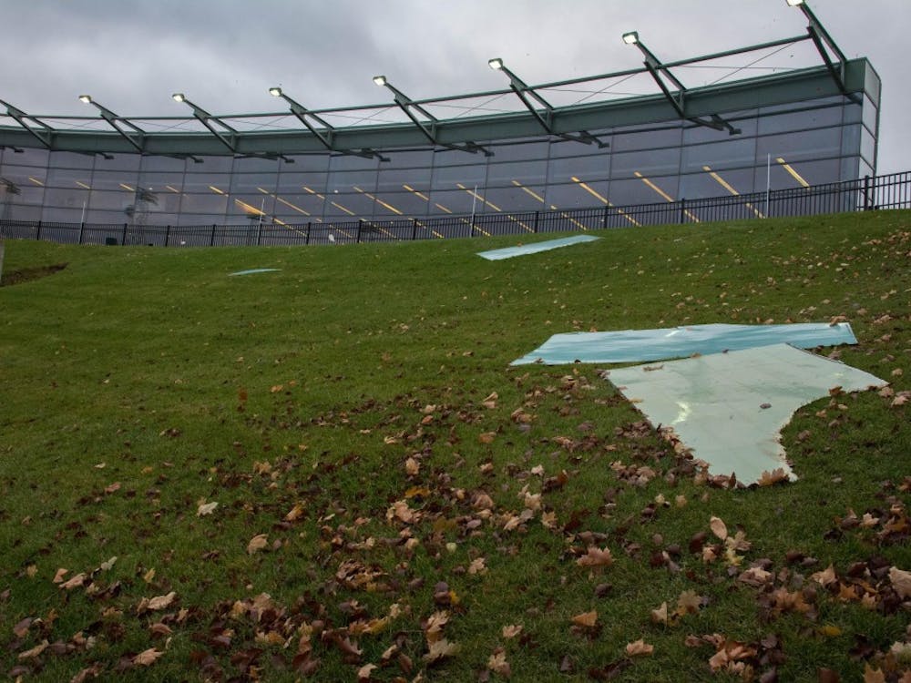 Photo by Sage StephensSome of the debris made it to the hill in Rynearson Stadium, but did not make it as far as the field.