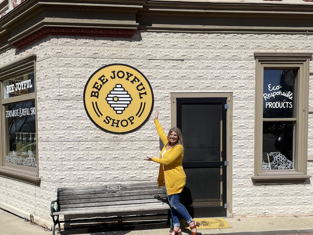 Jessica Thompson, the owner of Bee Joyful Zero Waste &amp; Refill Shop, stands in front of the newly opened shop (Photo Courtesy of Jessica Thompson). 