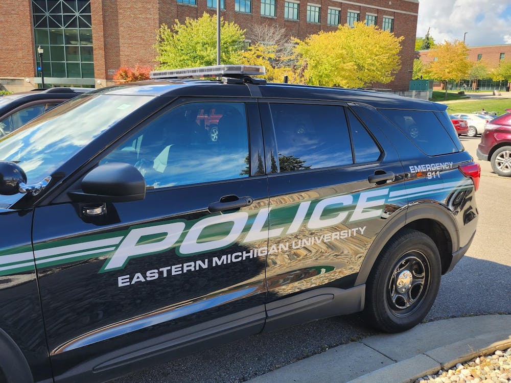 A vehicle used by the Eastern Michigan University Department of Public Safety is parked on campus where police leaders are launching a firearms detection project using artificial intelligence software that will be installed on security cameras on campus. (Eastern Echo File Photo)