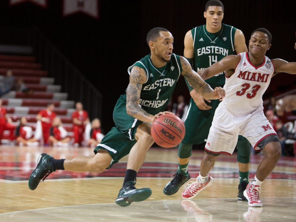Eastern Michigan guard Mike Talley drives to the basket in the Eagles 82-81 overtime loss to Miami (OH) in Oxford, OH.