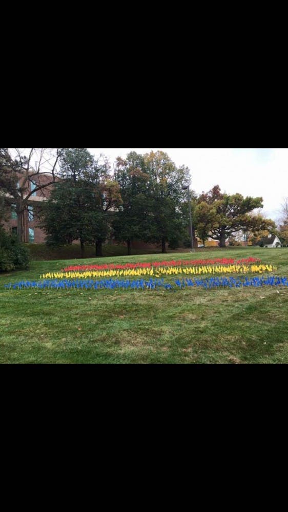 The LGBT flag display was defaced. 
