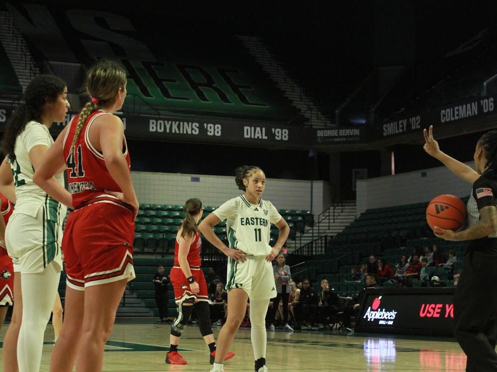 Austin (#11) prepares to shoot 2 free throws. EMU Women's Basketball vs. Northern Illinois University on Feb. 17 at the George Gervin GameAbove Center.