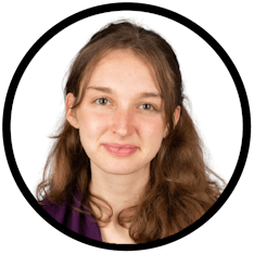 A black circle with a white background frames a smiling woman wearing a purple shirt.