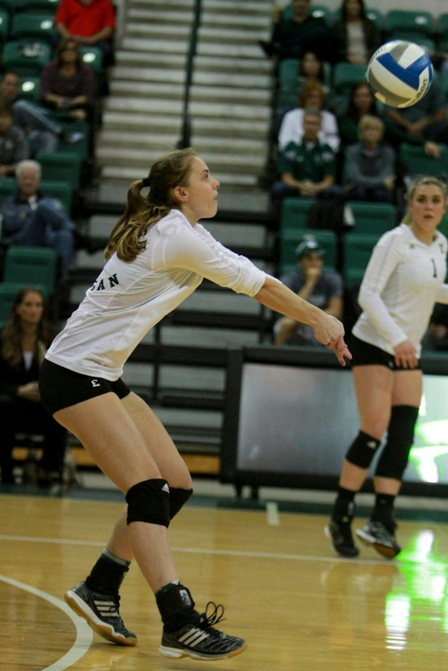 Rachel Irbe bumps the ball during the volleyball game against Western Michigan at the Convocation Center in Ypsilanti on Friday, September 30, 2016.