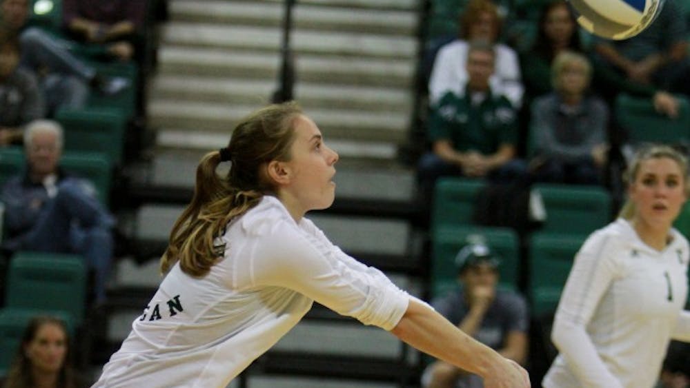 Rachel Irbe bumps the ball during the volleyball game against Western Michigan at the Convocation Center in Ypsilanti on Friday, September 30, 2016.