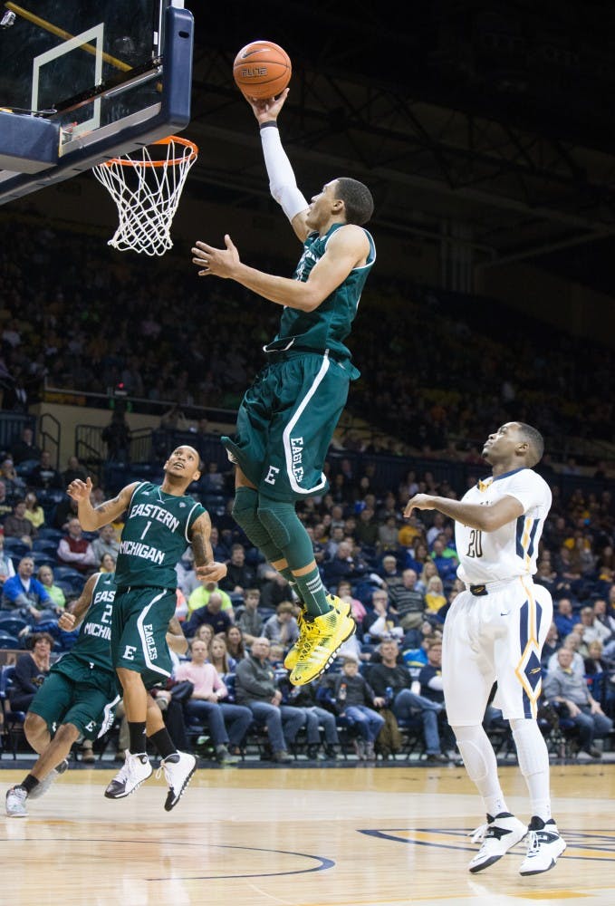Eastern Michigan forward Karrington Ward (14) goes in for the layup in the Eagles 77-66 loss to Toledo Saturday afternoon.