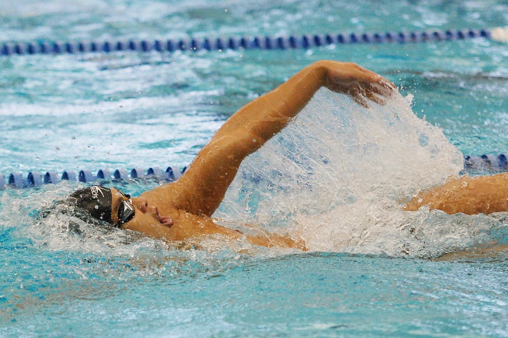 Swimming wins 59th-straight MAC meet