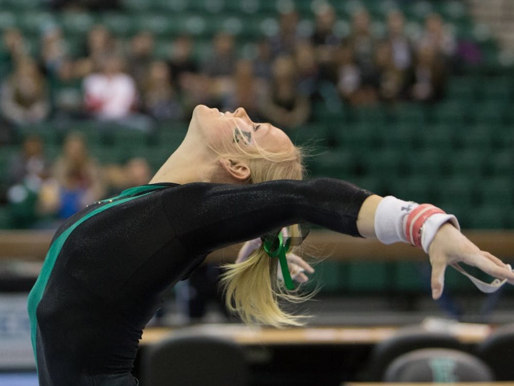 Eastern Michigan senior Nikki Paterson scored a career high 9.775 on the bars in the Eagles 194.700-193.800 win over Kent State on Feb. 7 2015 in Ypsilanti.