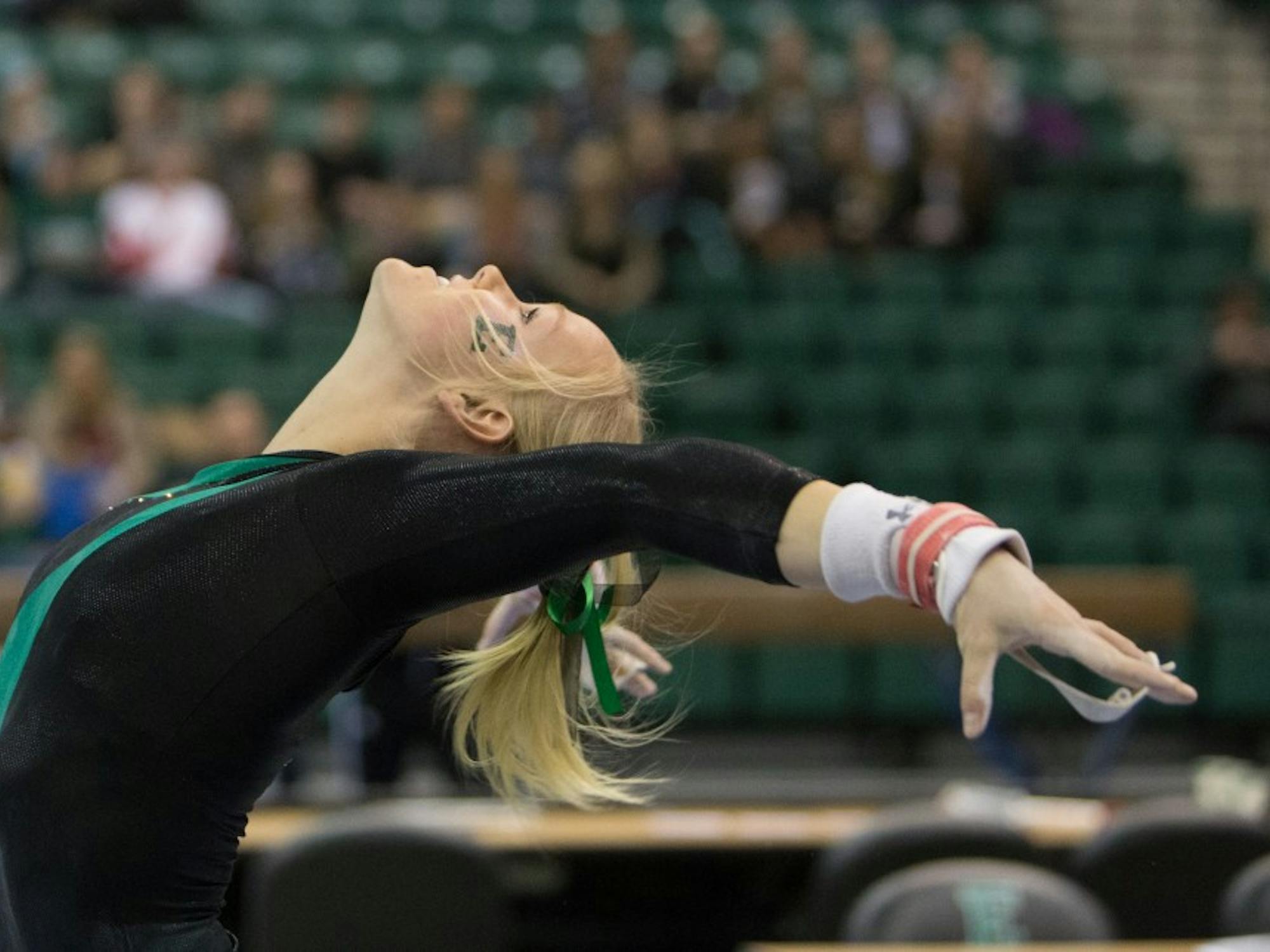 Eastern Michigan senior Nikki Paterson scored a career high 9.775 on the bars in the Eagles 194.700-193.800 win over Kent State on Feb. 7 2015 in Ypsilanti.