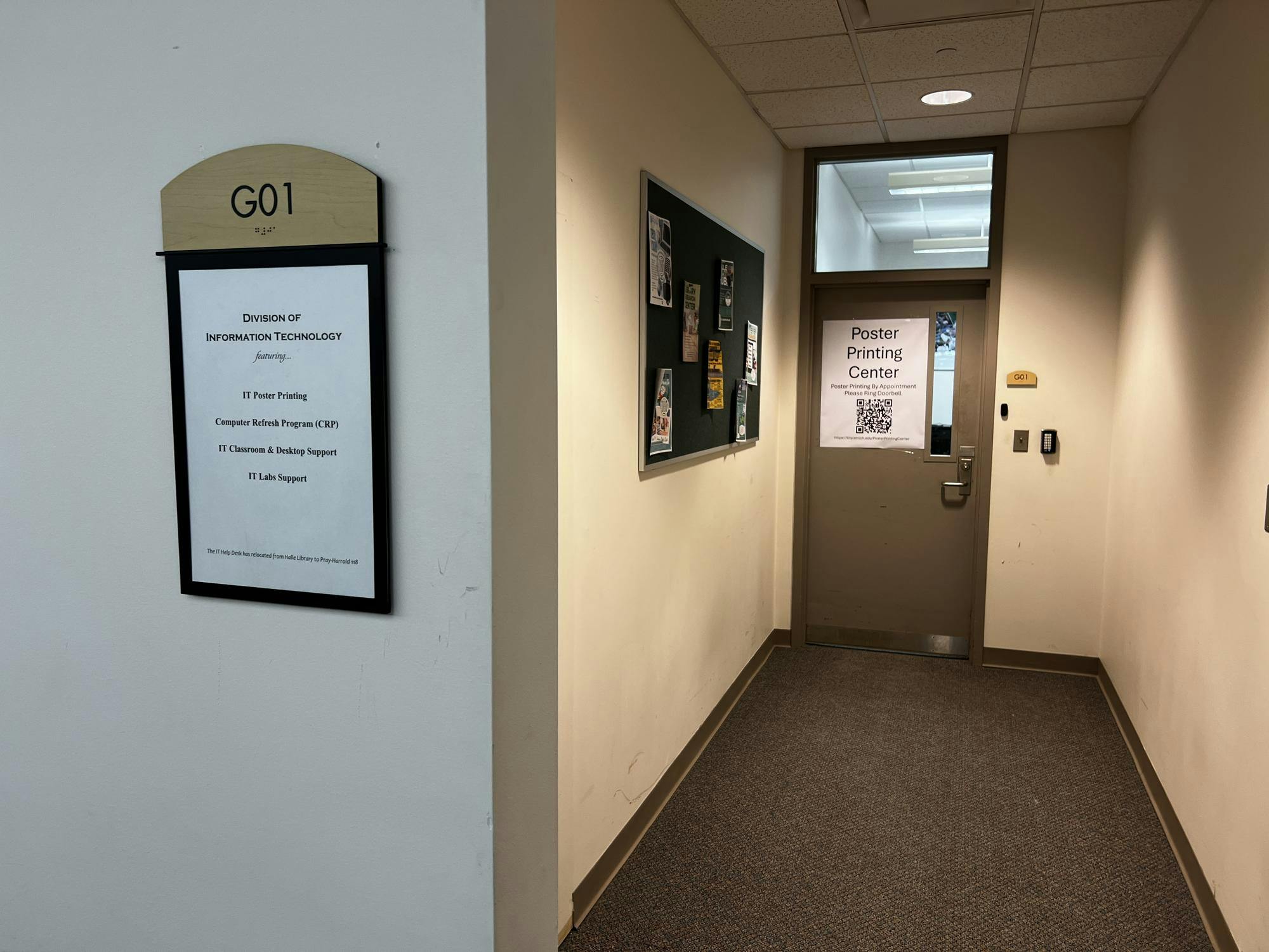 A room at the end of a short hallway where the Poster Printing Center is located. There is also a bulletin board in the hallway.
