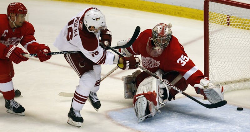 Petr Prucha scores the game winning goal for the Phoenix Coyotes on Red Wings goaltender Jimmy Howard in the third period. 