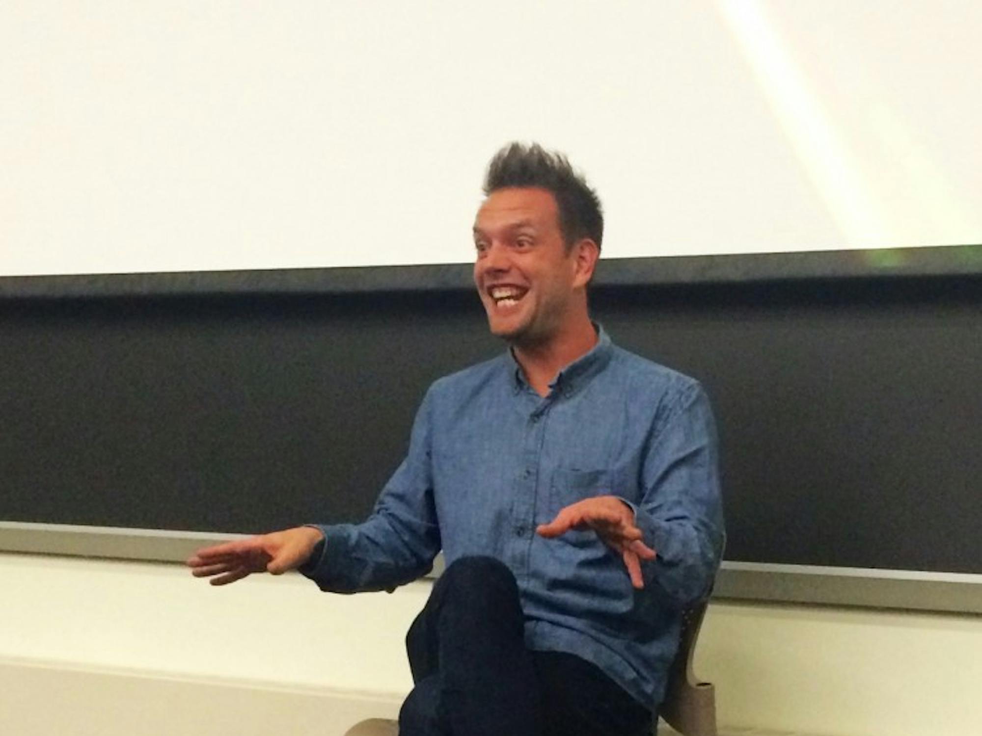 Josh Rivedal performs his one-man show "Kicking My Blue Genes in the Butt" for students.