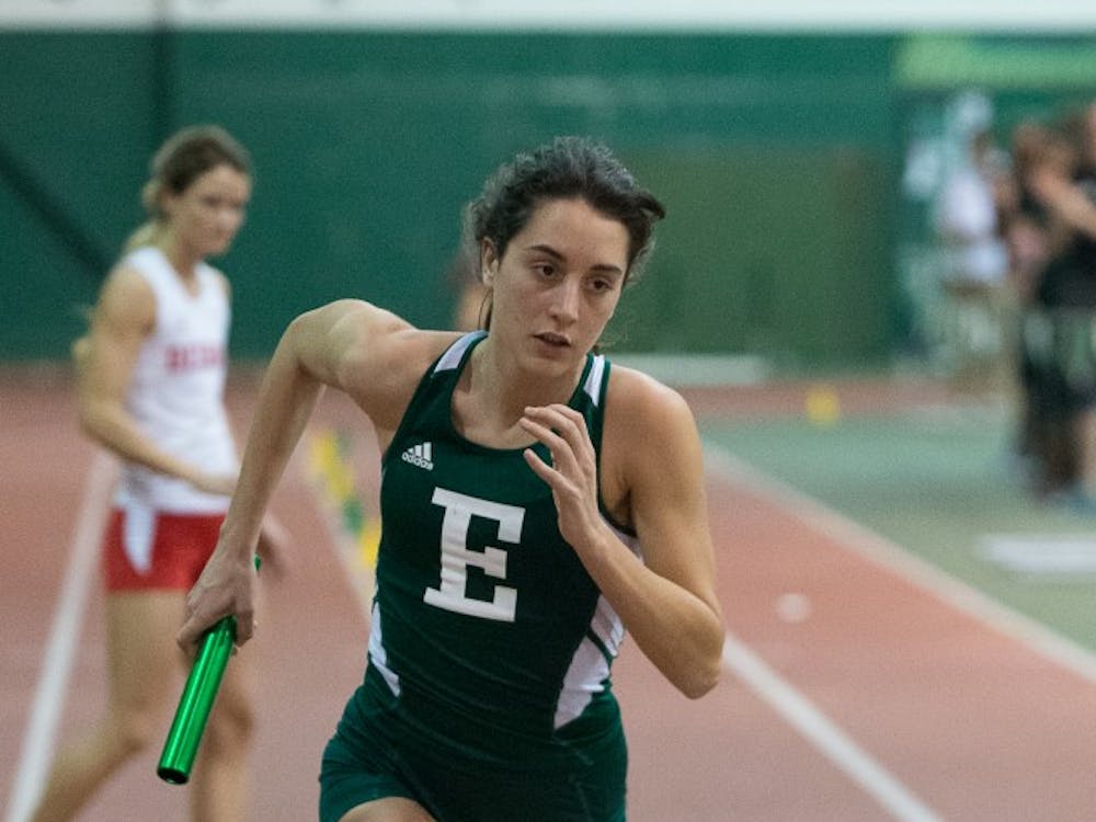 Eastern Michigan distance runner Marina Manjon-Rivadulla takes over for her leg of the 1600m during the EMU Triangular on 10 January at Bowen Field House.