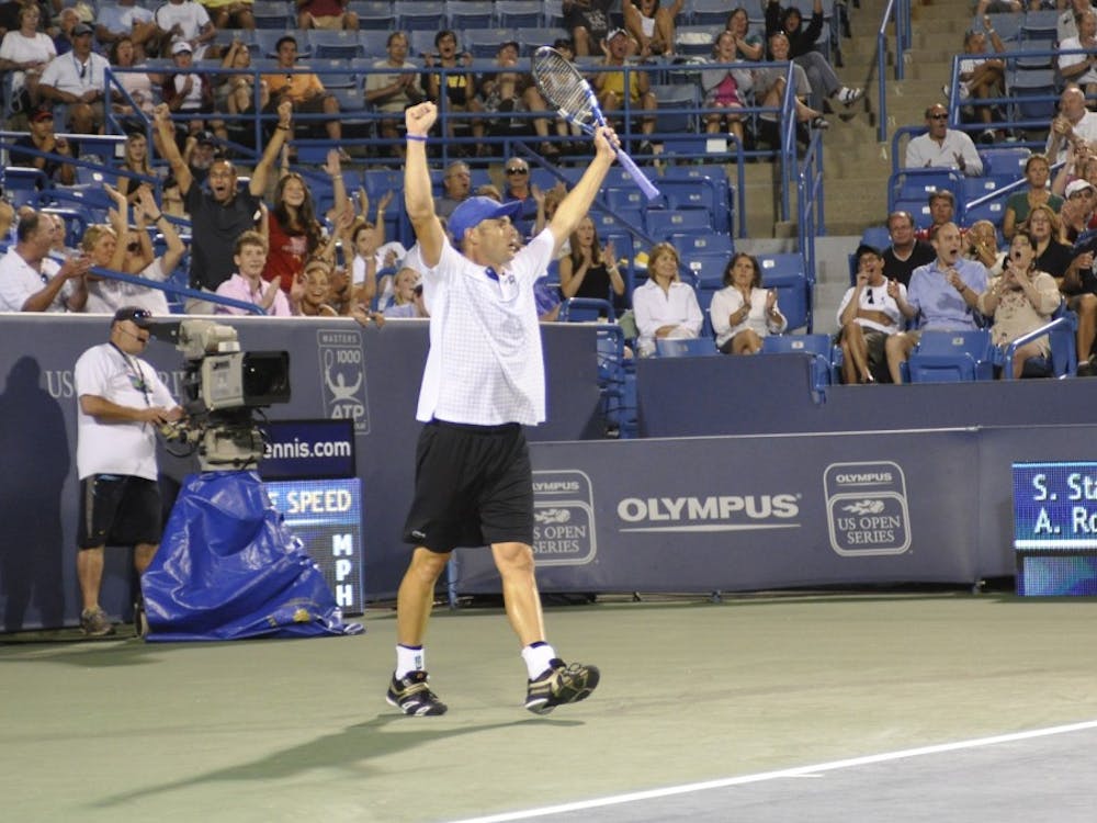 Andy Roddick celebrated after breaking Sergiy Stakhovsky's serve to win the second game of the third set in their first round match Monday.