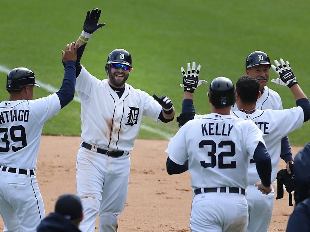The Detroit Tigers' Alex Avila celebrates his game-winning RBI during ninth-inning action against the Kansas City Royals at Comerica Park in Detroit, Michigan, on Thursday, September 27, 2012. The Tigers rallied to edge the Royals, 5-4. (Diane Weiss/Detroit Free Press/MCT)