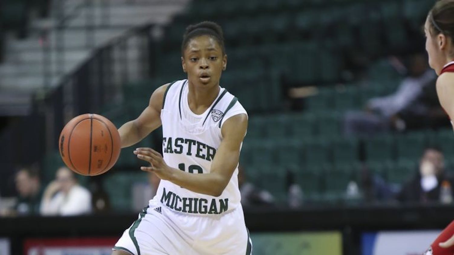 Bianca Cage (10) drives the ball to the hoop. Cage scored 23 points in the team’s win over NIU on Thursday. The game marked her first career start.