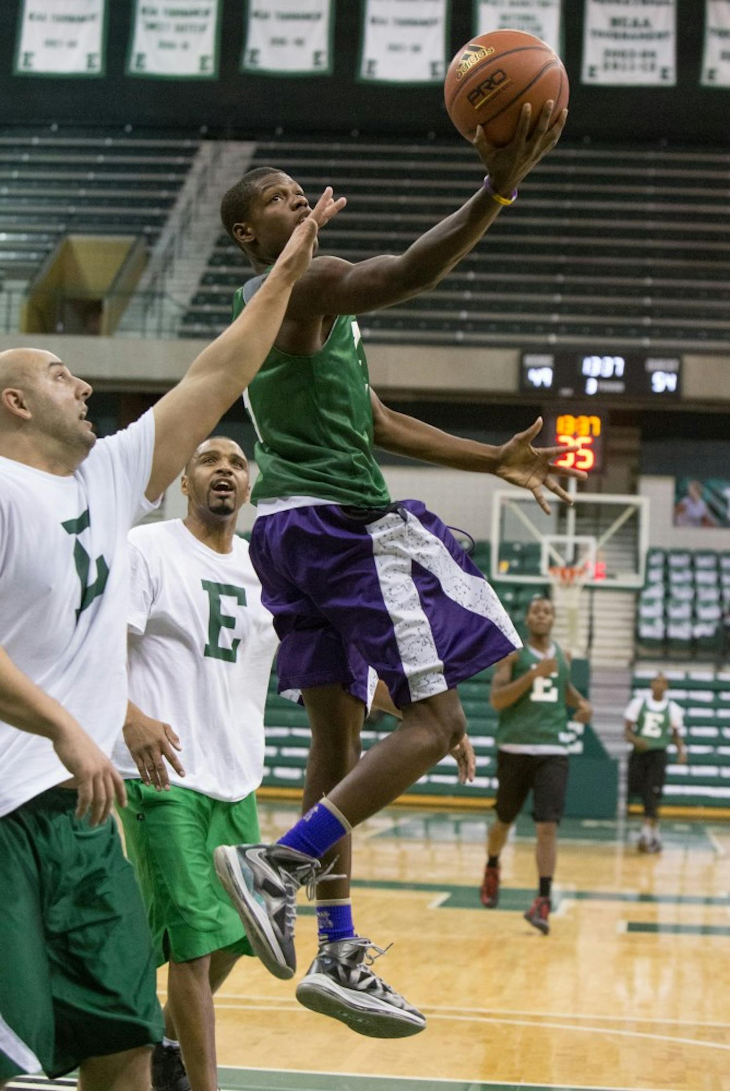 	The Student team (green) won for the first time in the 3rd annual game Thursday night at the Convocation Center.