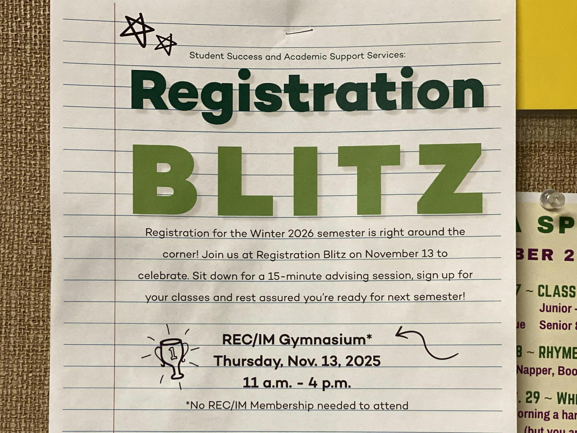 Flyer for Registration Blitz pinned to a bulletin board.