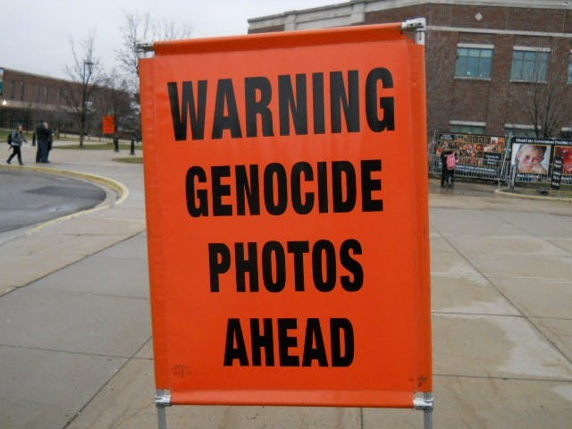 	A sign warning passers-by about the graphic images presented in the GAP display. 