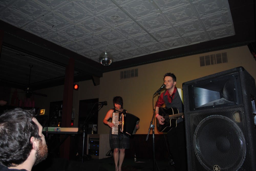 	Despite the $5 cover charge, loud music draws in customers looking for a little less conversation.