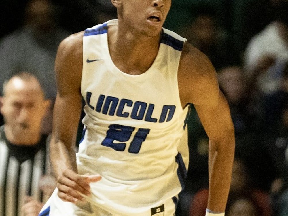 Emoni Bates pushes across the court during a Lincoln High School game against Okemos on Dec. 28, 2019. (Echo file photo) 