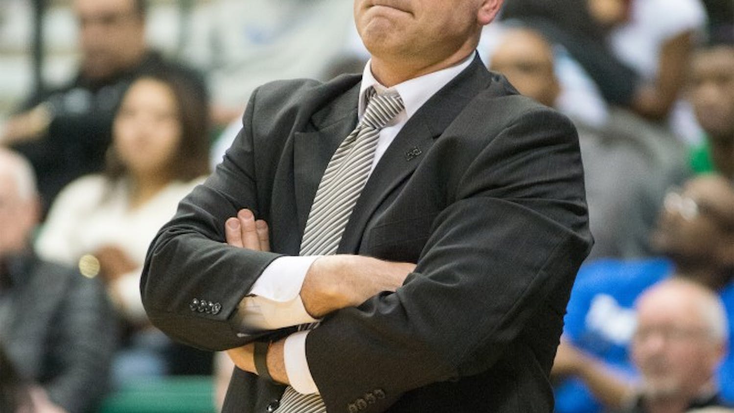 Eastern Michigan head coach Tory Verdi doesn't look happy about the poor first-half performance of the Eagles during their game against Central Michigan on 8 March at the Convocation Center.  The second half turned around, and EMU won 99-83 in an overtime thriller.