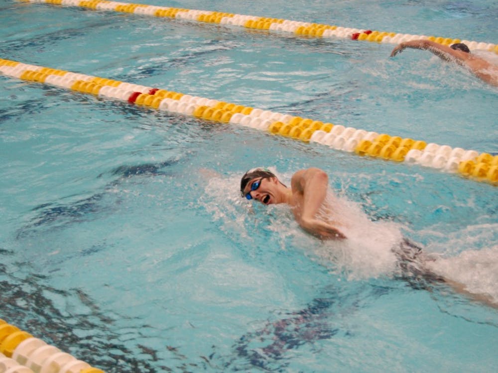 	Dylan Crompton powers his way through the water in the 200-freestyle.