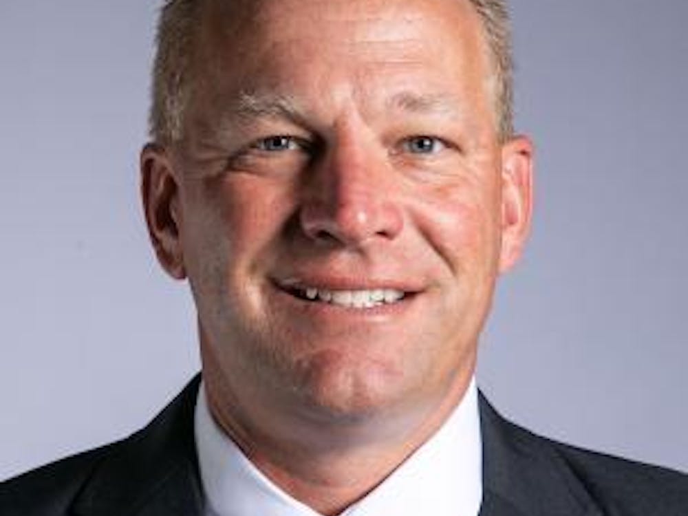 Former Washington head coach and EMU offensive coordinator Kalen DeBoer taking his headshot after being announced the head coach at the University of Washington on Nov. 29, 2021.